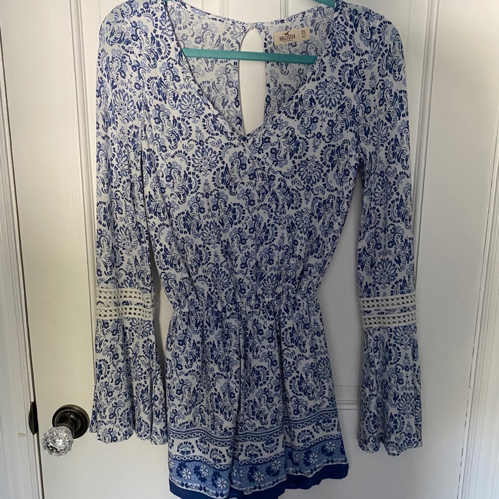 Hollister romper with flare sleeves.